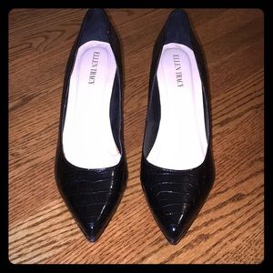 Black pointed toe pumps